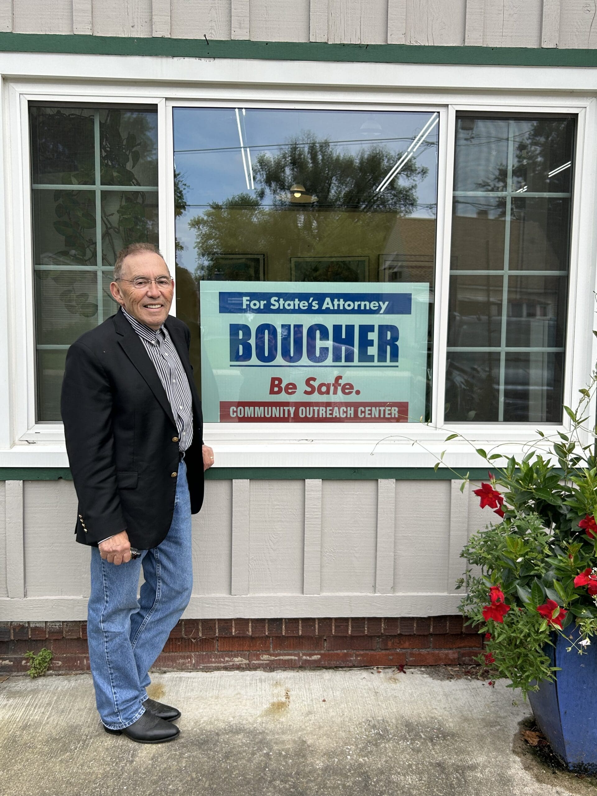 Robert Boucher standing outside of his West Peoria Campaign Community Outreach Center